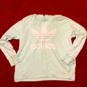 A mint green sweatshirt